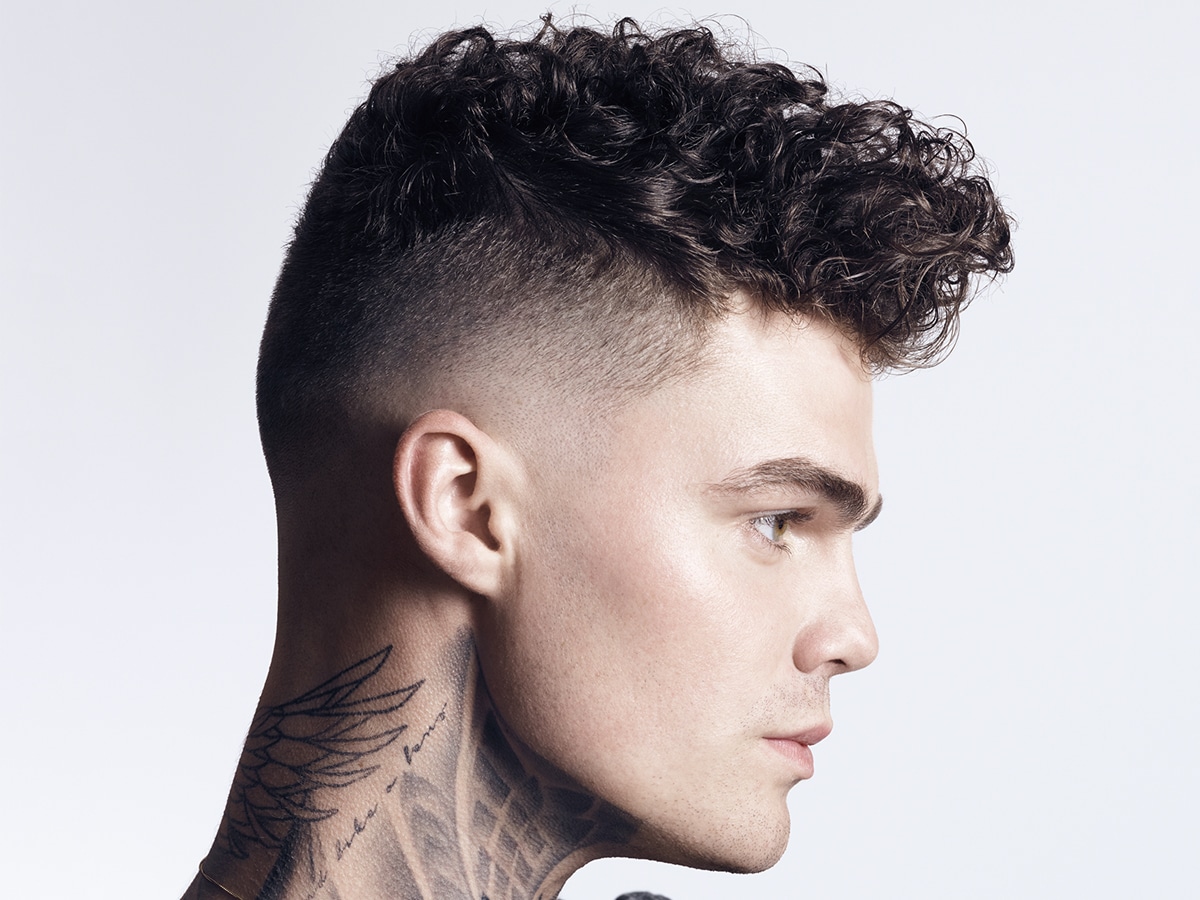 Close up of man with High Fade Curly Hair