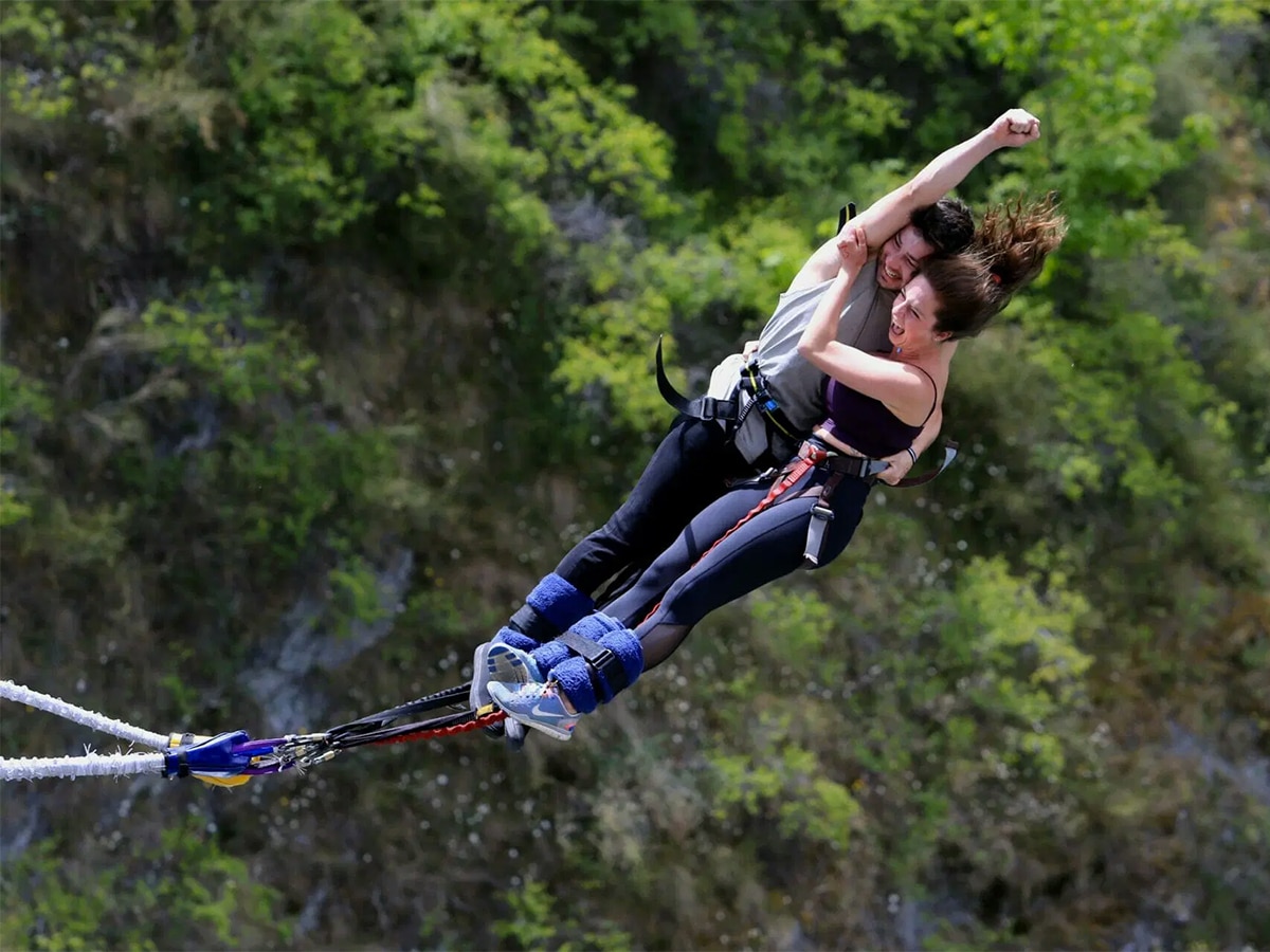 Couple doing tandem bungee jump