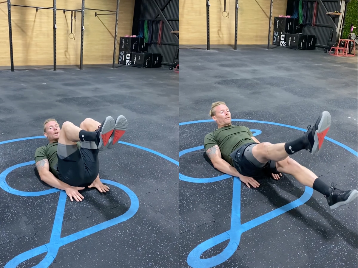 James Newbury doing hollow body flutter kicks workout