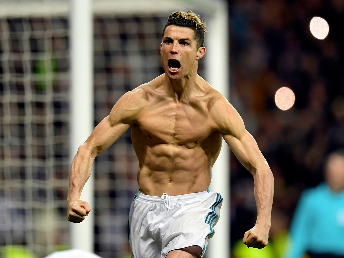Shirtless Cristiano Ronaldo shouting after scoring a goal