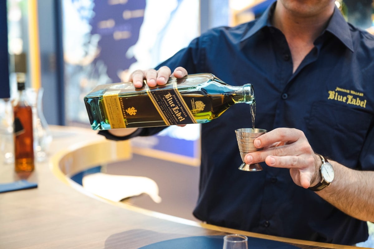 Pouring Entering Johnnie Walker Blue Room Whisky Bar in Pitt St Mall