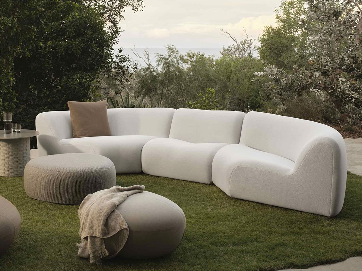 King Living 1977 Outdoor Modular sofa features two curve modules and one chair module