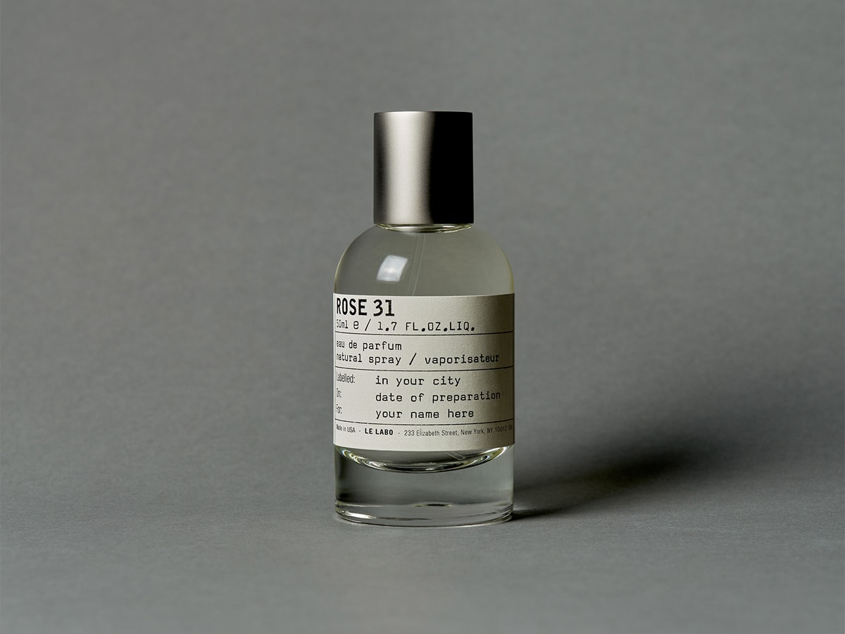 Product image of Le Labo Rose 31 fragrance bottle with grey background