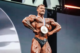 Chris Bumstead claiming his fifth consecutive Classic Physique Olympia title in Orlando | Image: Mrolympiallc/Instagram