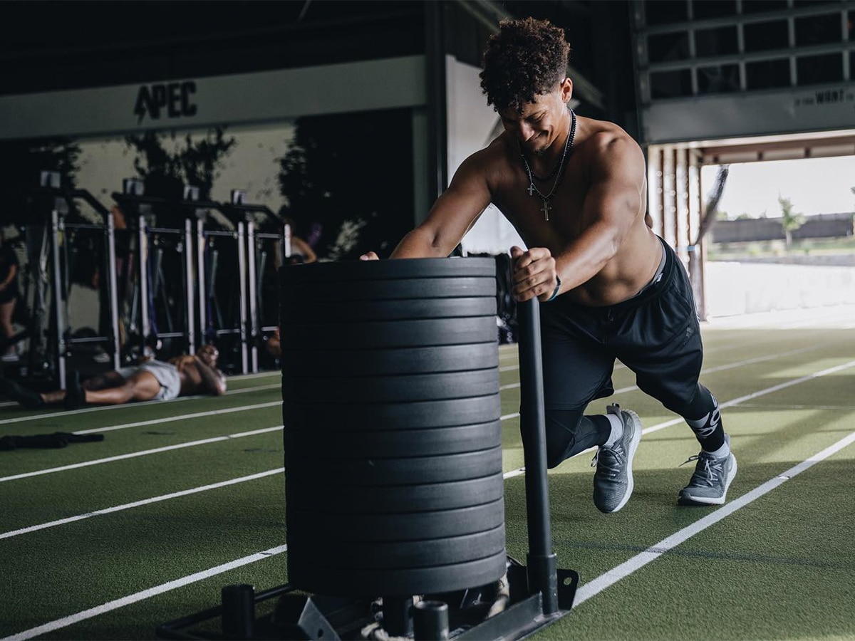 Patrick Mahomes doing sled push workout