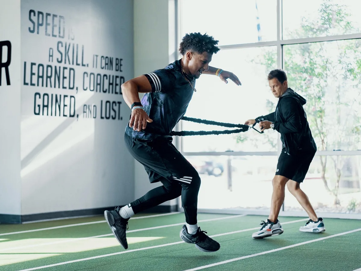 Patrick Mahomes working out with his personal trainer