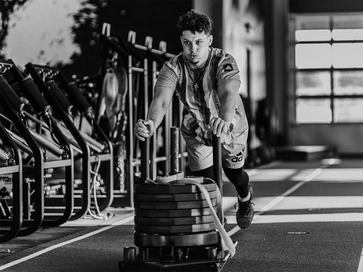 Patrick Mahomes doing sled push workout