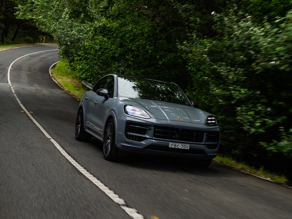 2024 porsche cayenne coupe driving on the road