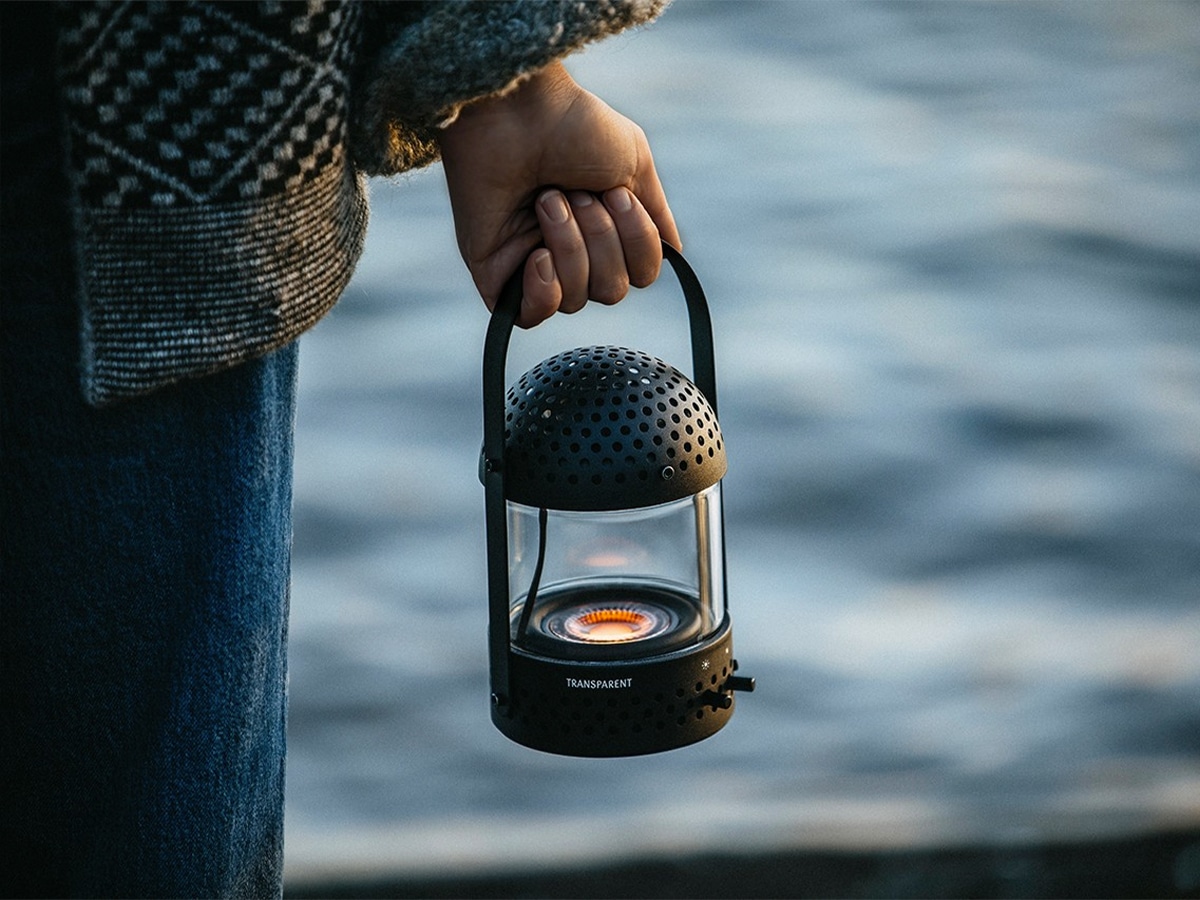 Hand holding Transparent Sound Speaker lantern