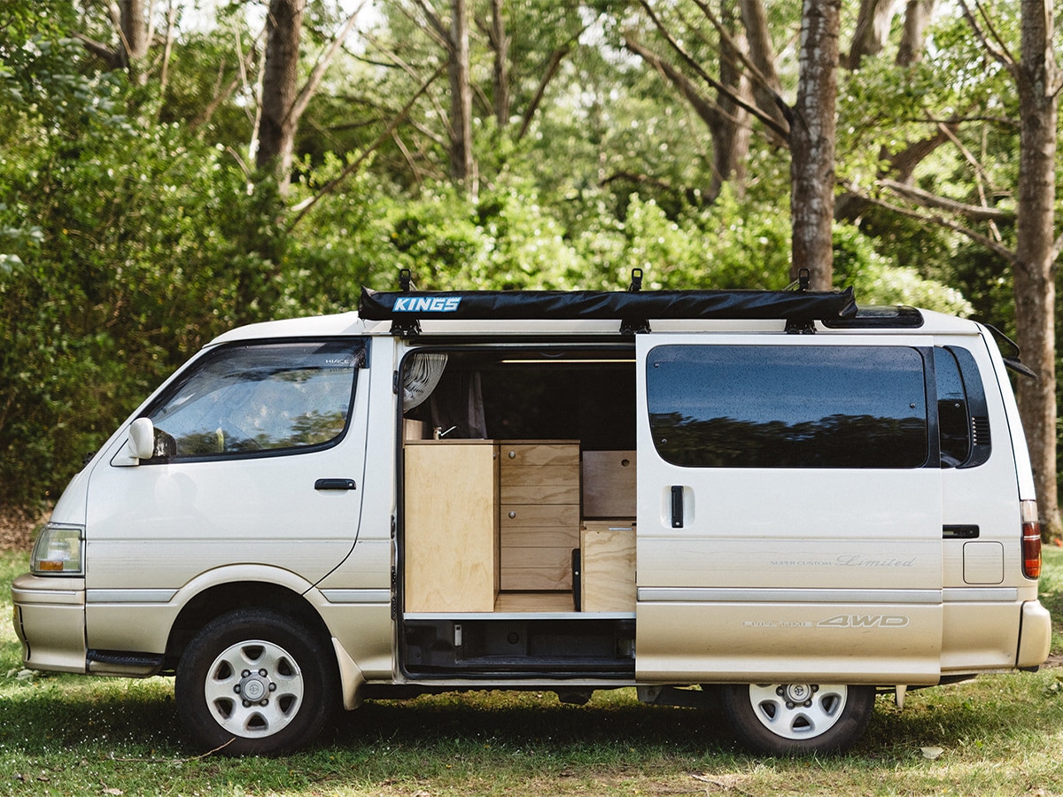 Toyota Hiace custom campervan conversion on the road