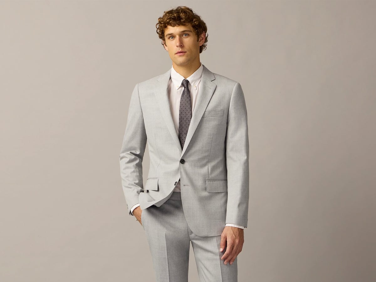 Man in a light grey suit