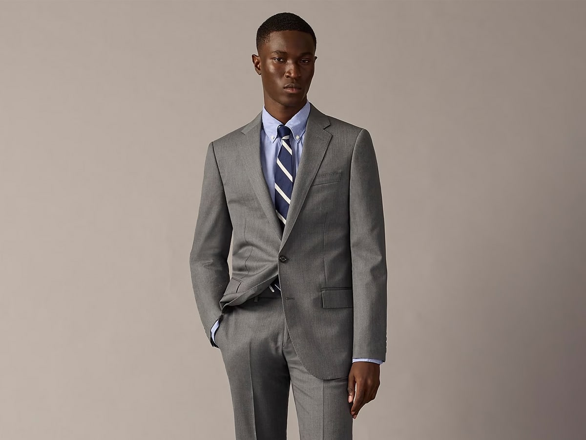 Man in a mid grey suit