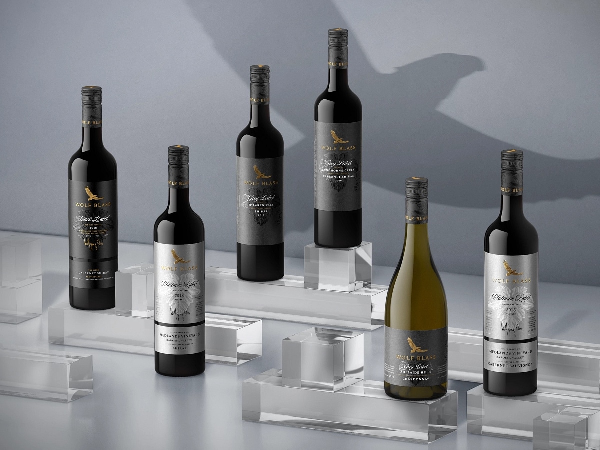 Wolf Blass Luxury Collection bottles set on top of glass blocks with a bird shadow background