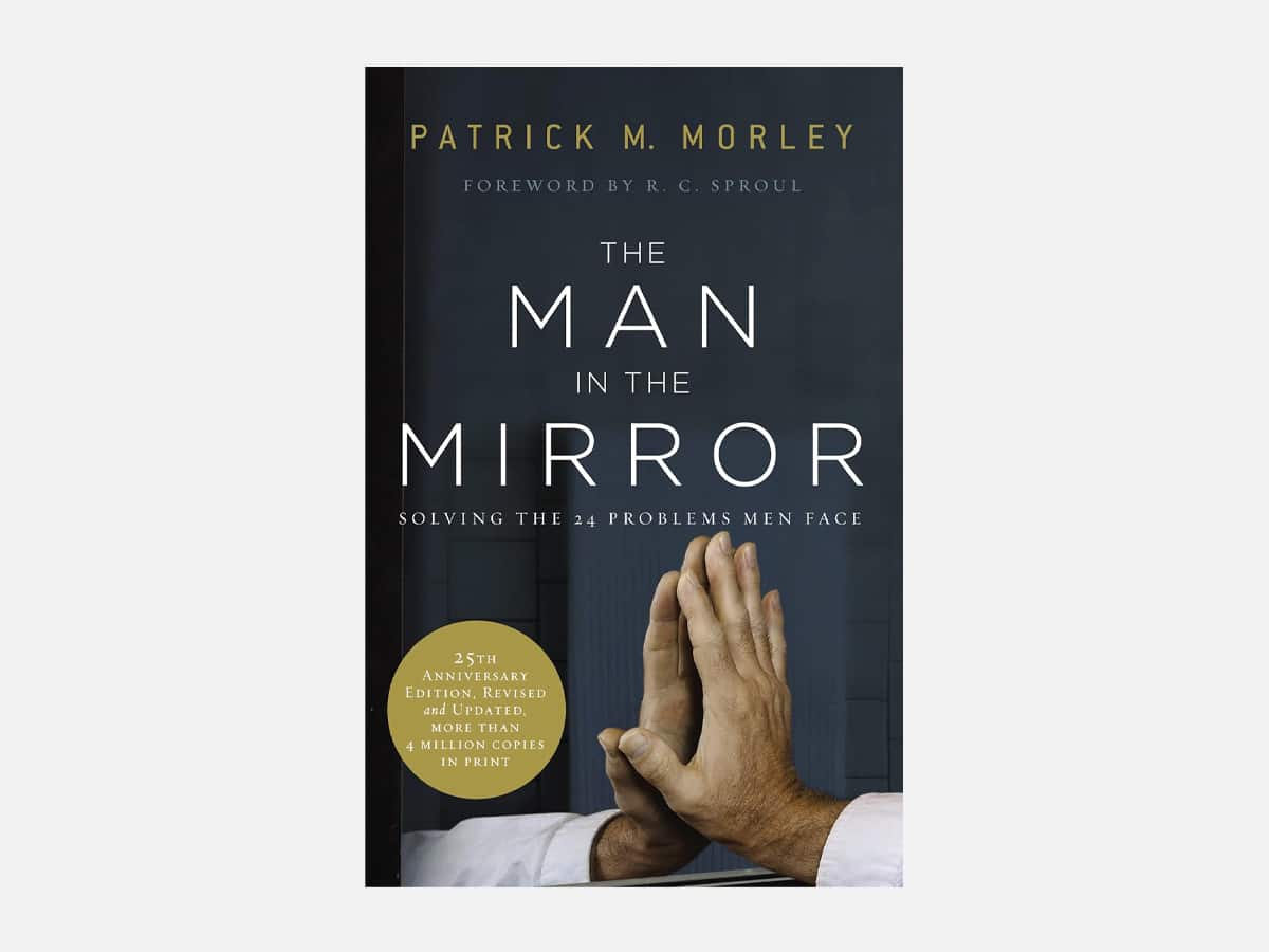 'The Man in the Mirror: Solving the 24 Problems Men Face' book cover