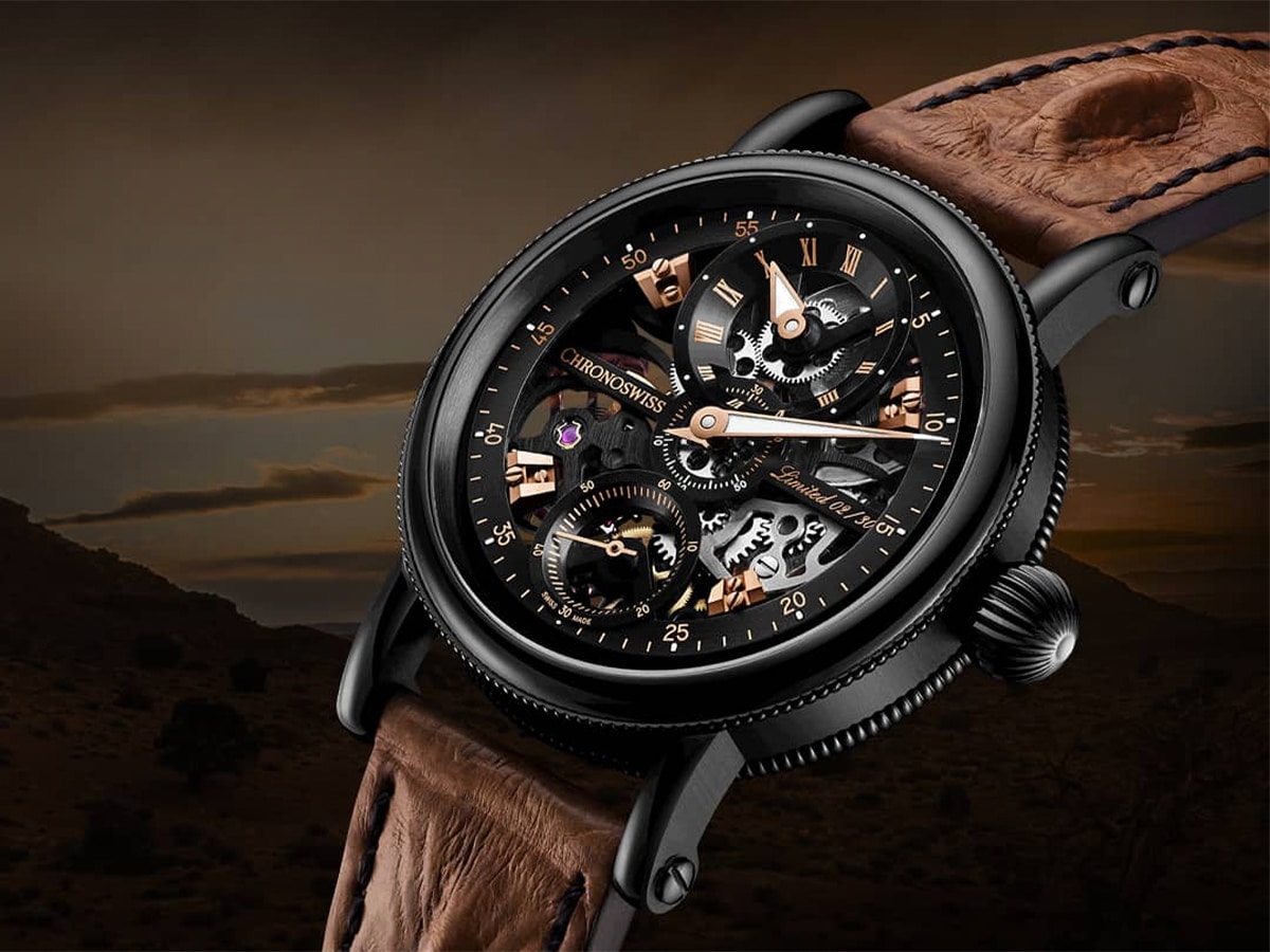 Chronoswiss black and brown watch with low exposure sunset background
