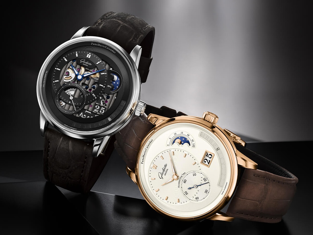 Two Glashütte Original watches side by side against dark background