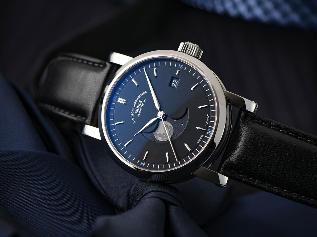 Mühle Glashütte watch set on dark blue fabric