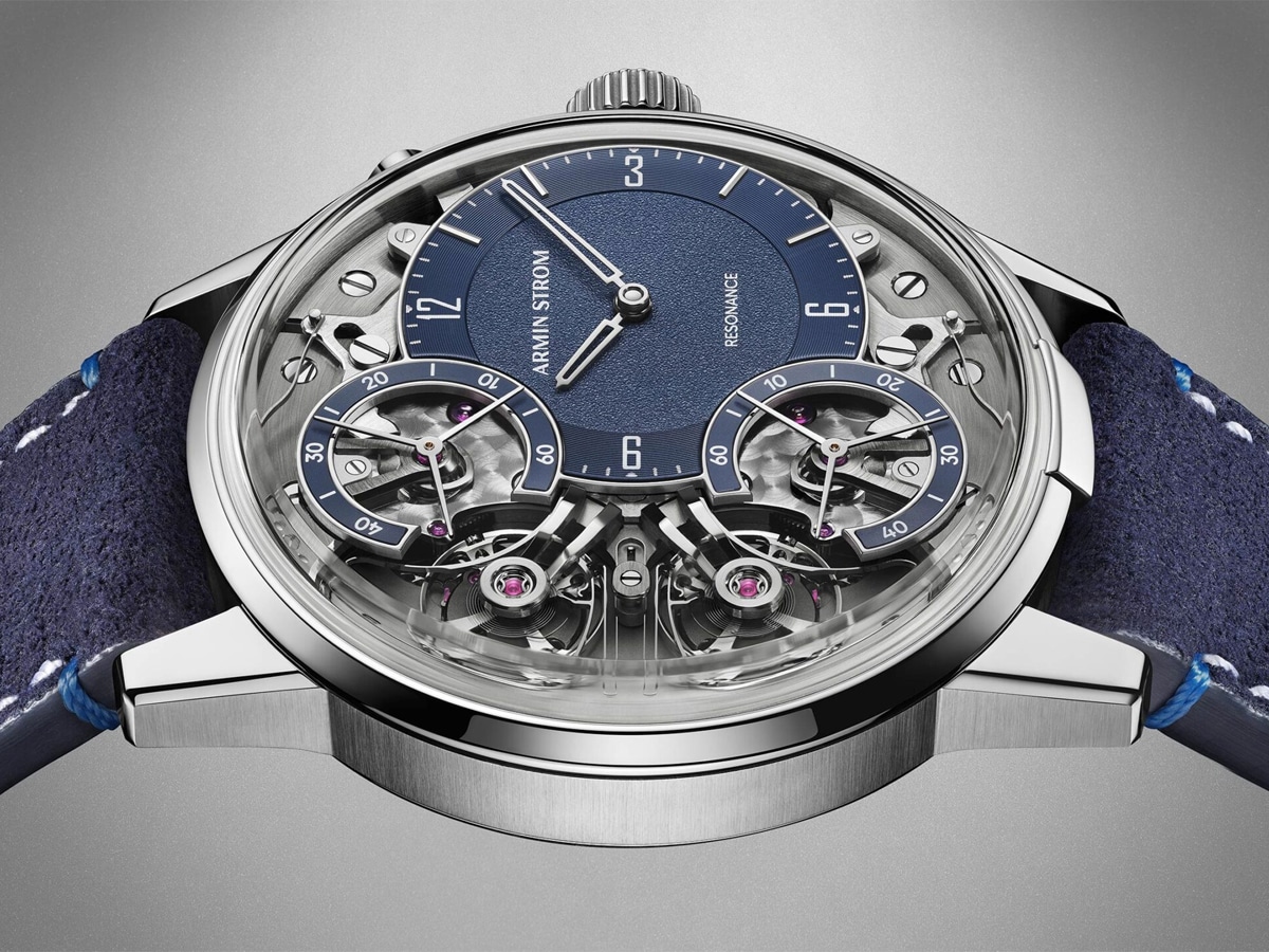 Armin Strom silver watch with blue strap