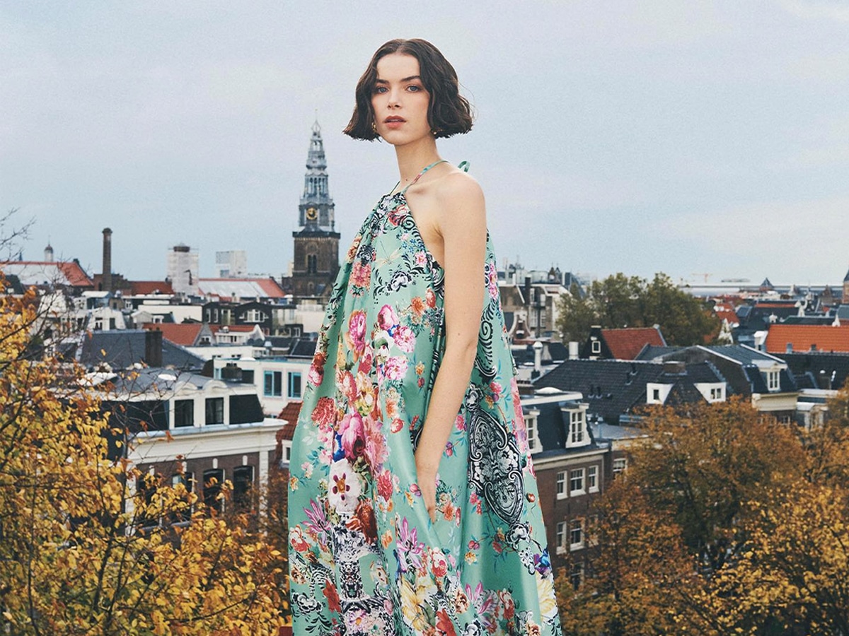 Female model wearing a floral printed maxi dress