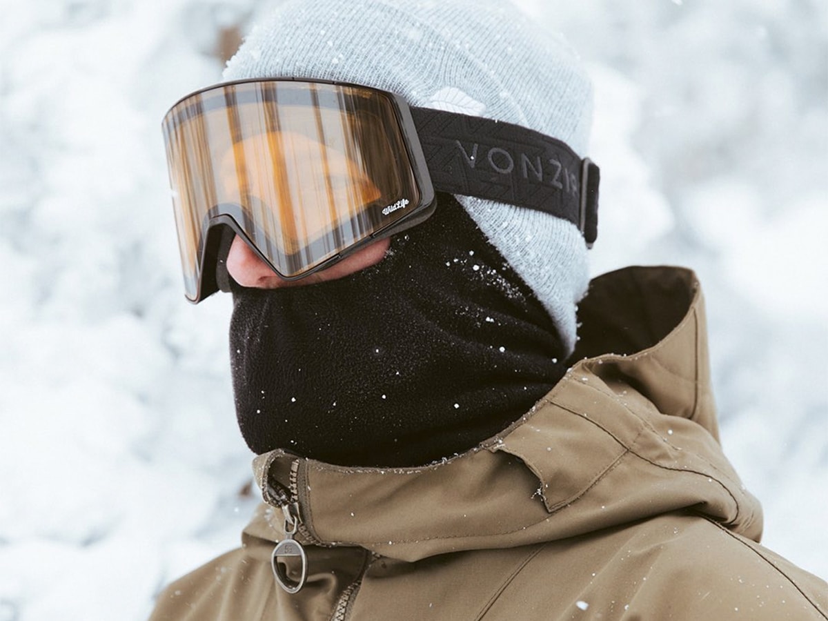 Male model wearing ski goggles