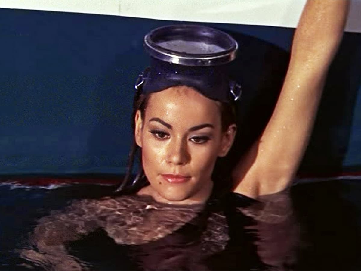 Claudine Auger in the water