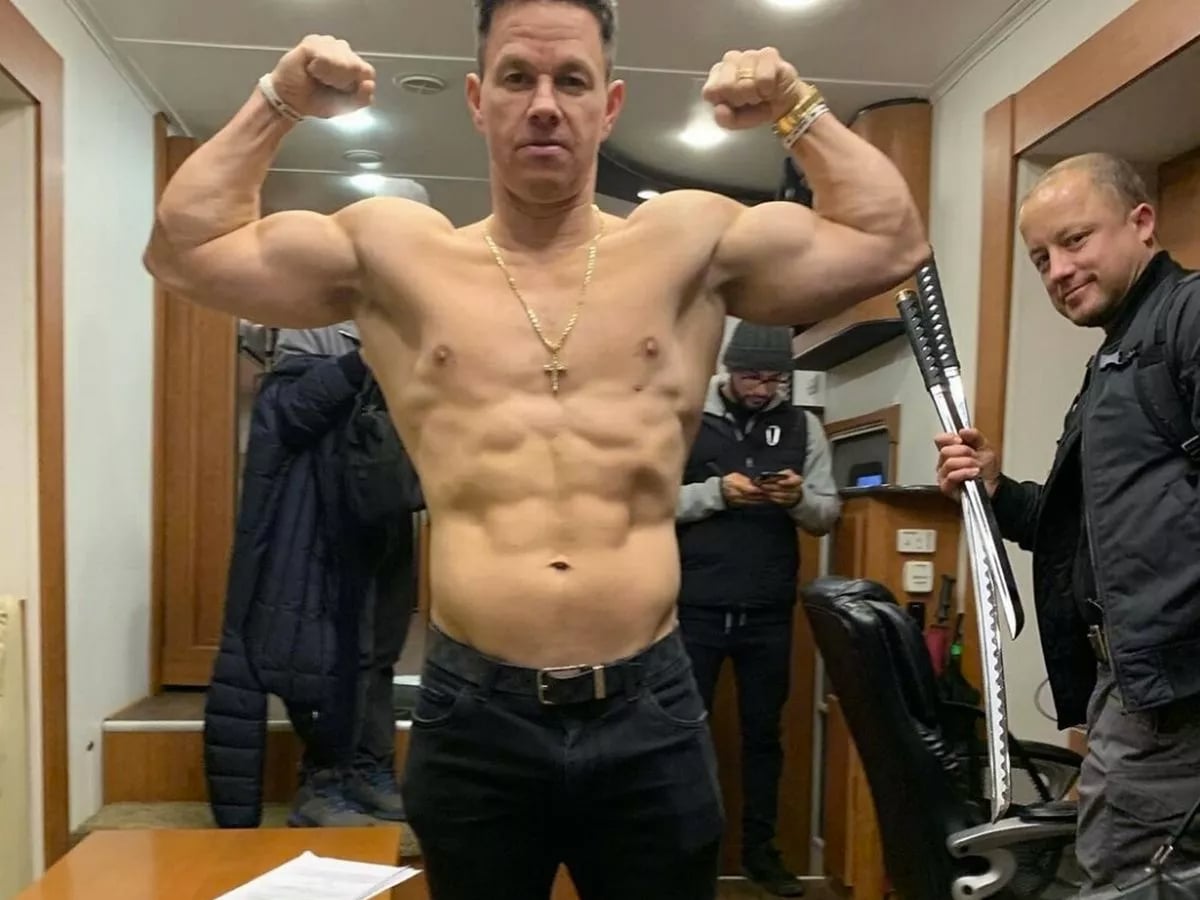 Mark Wahlberg flexing muscles