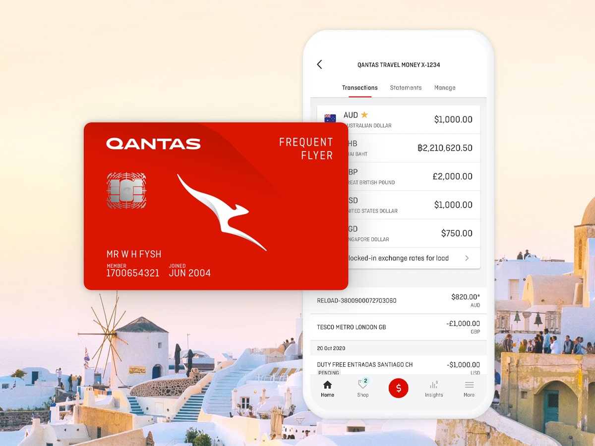 Edited image of Qantas card in front of a phone showing Qantas Travel Money app