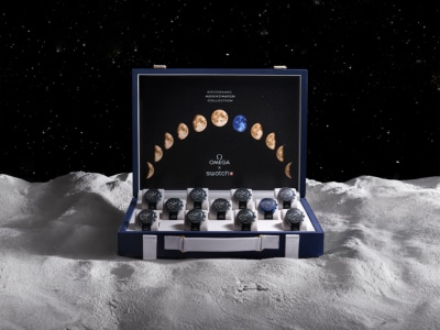 'World First' OMEGA MoonSwatch Suitcases Sell for Combined $900,000