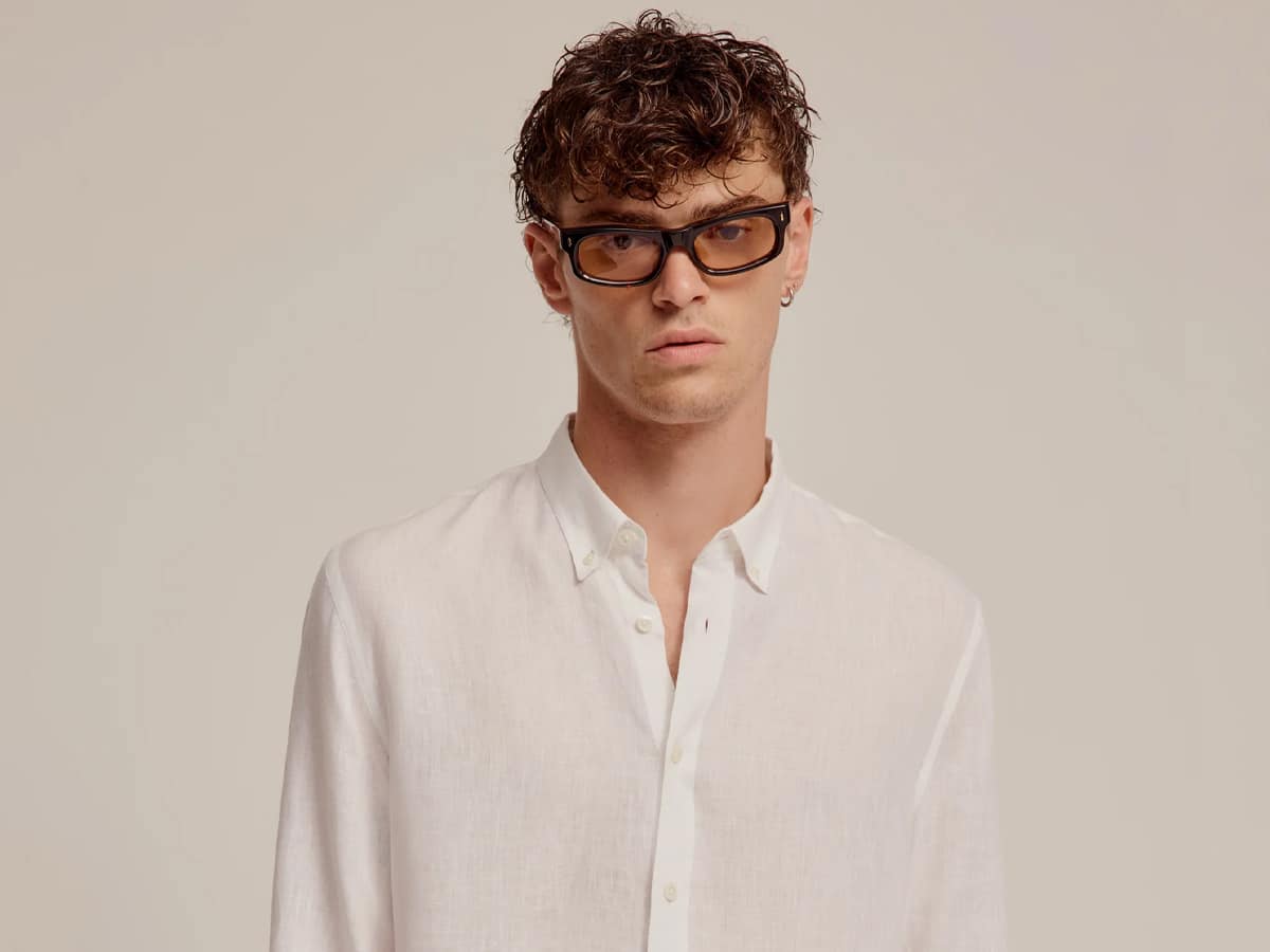 Male model in a white long sleeves shirt