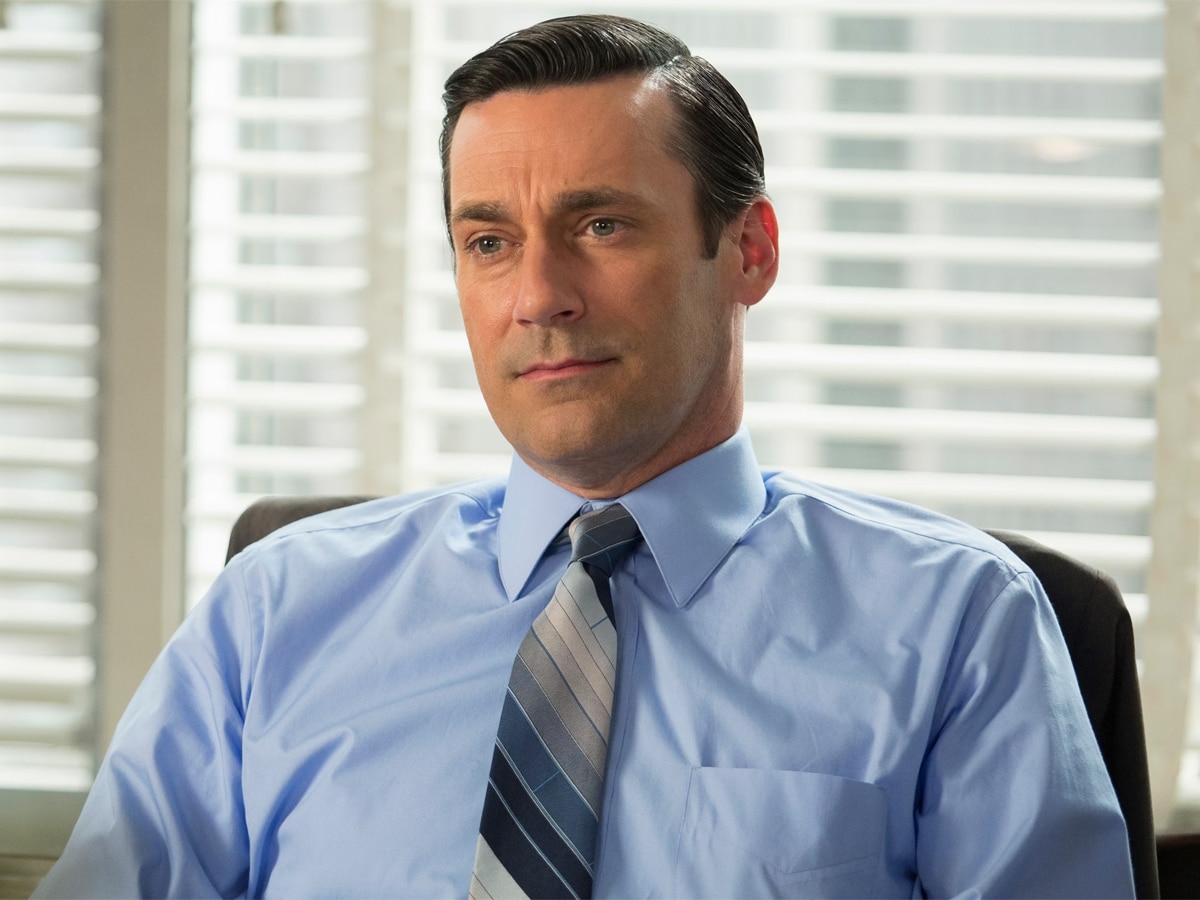 Jon Hamm with a slicked-back side part hairstyle
