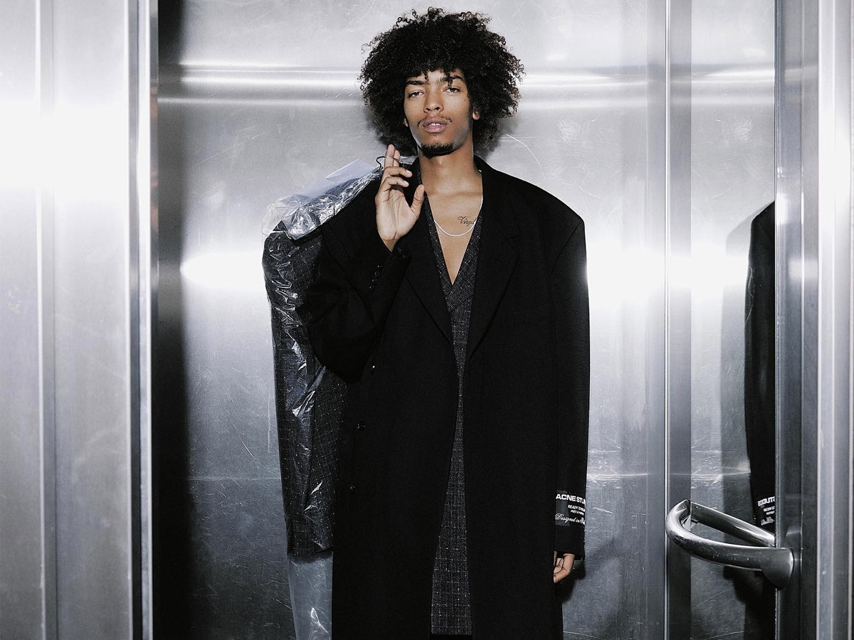 Male model in a black coat