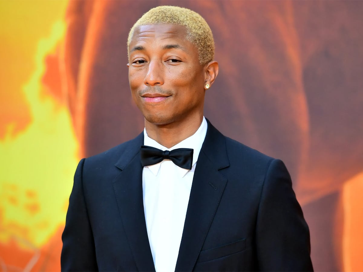 Pharrell Williams in a black and white suit