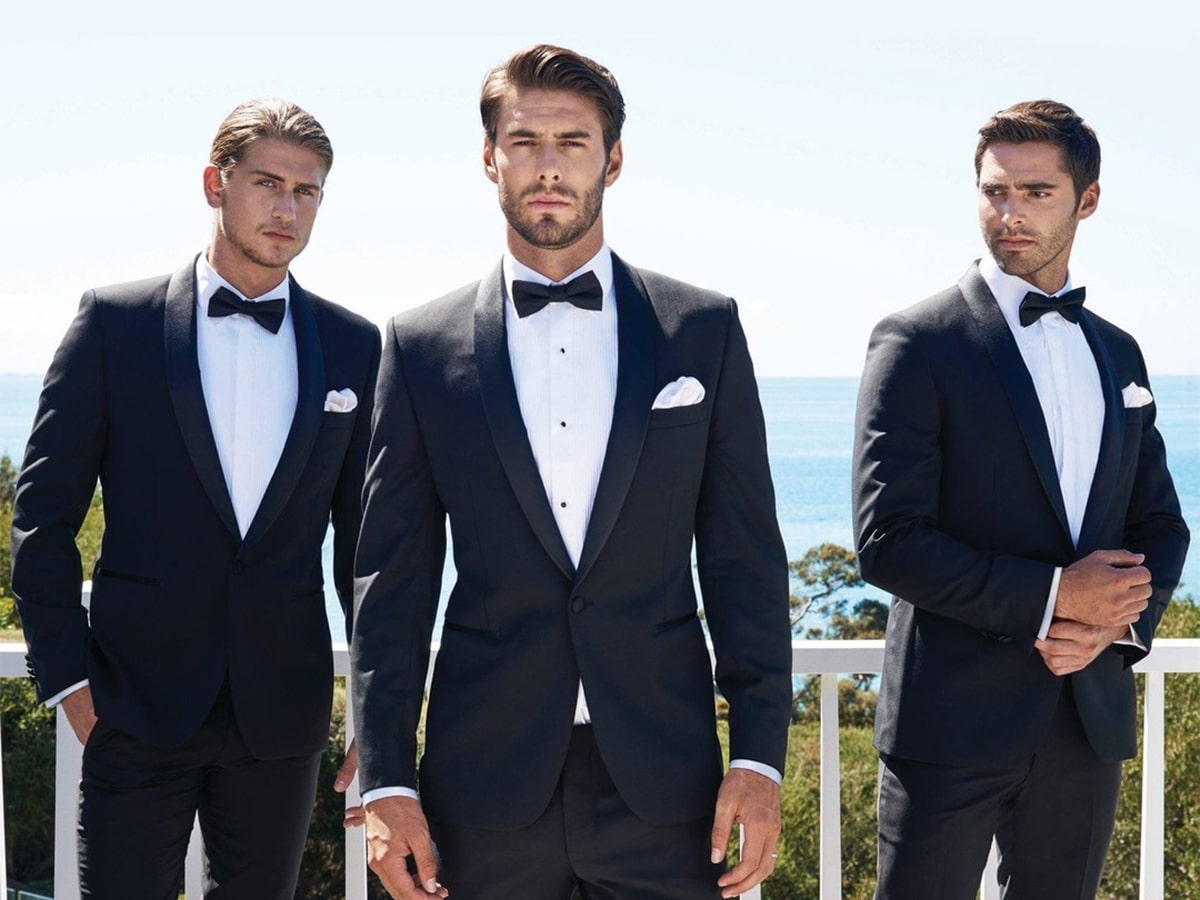 Three male models in suits