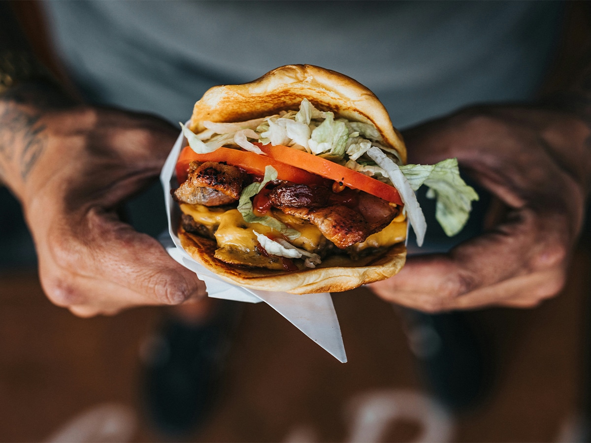 Win an Uber Eats voucher worth $250 by completing our reader survey | Image: Nathan Dumlao