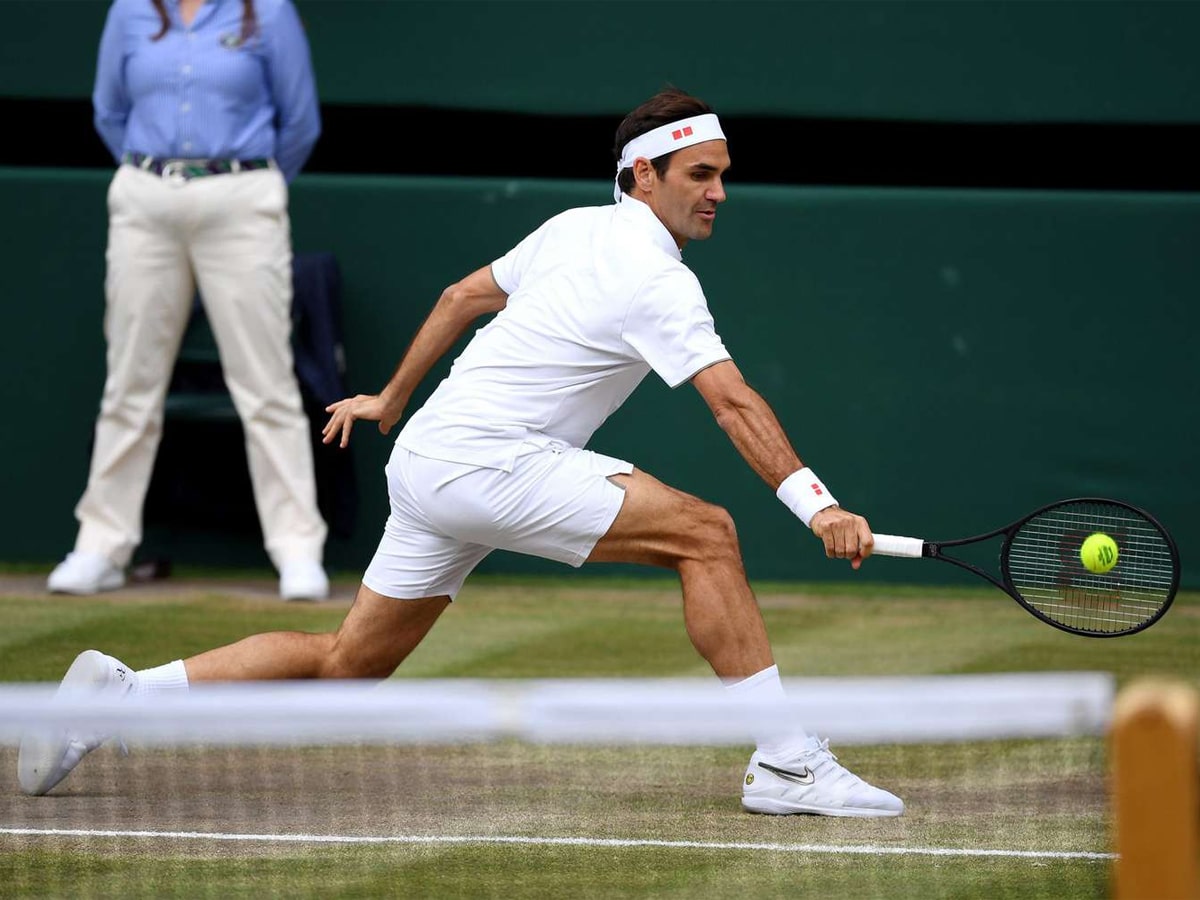 Roger Federer hitting a tennis ball