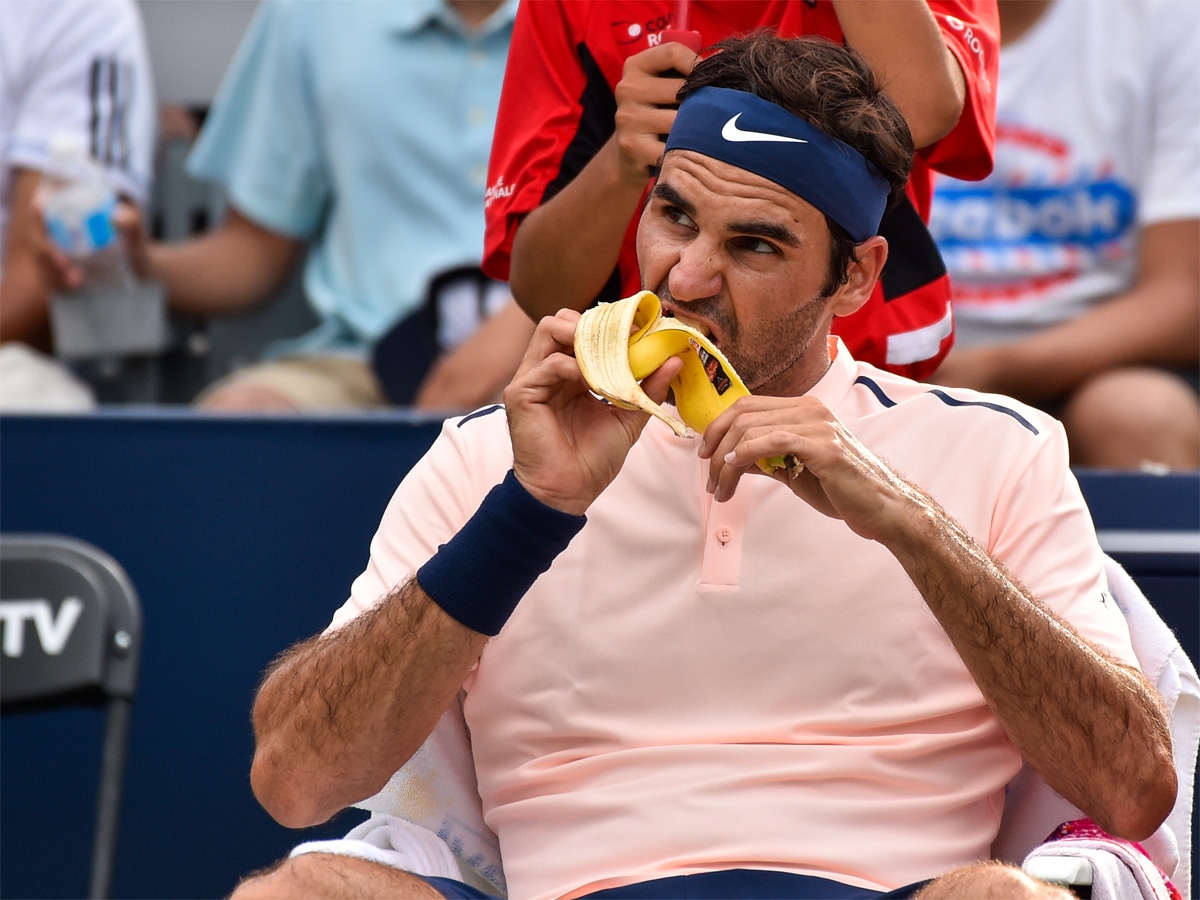 Roger Federer eating a banana