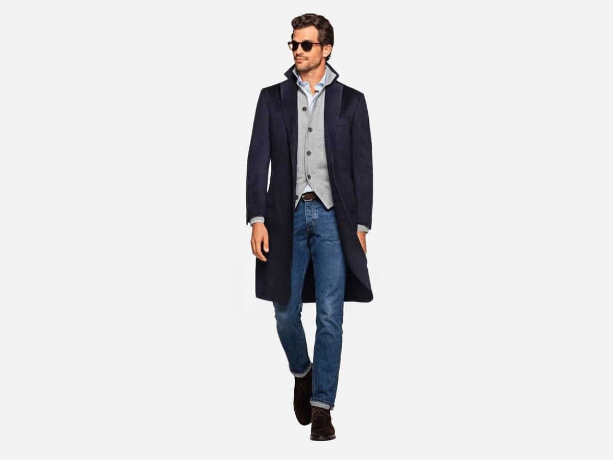 Male model in selvedge jeans with structured coat