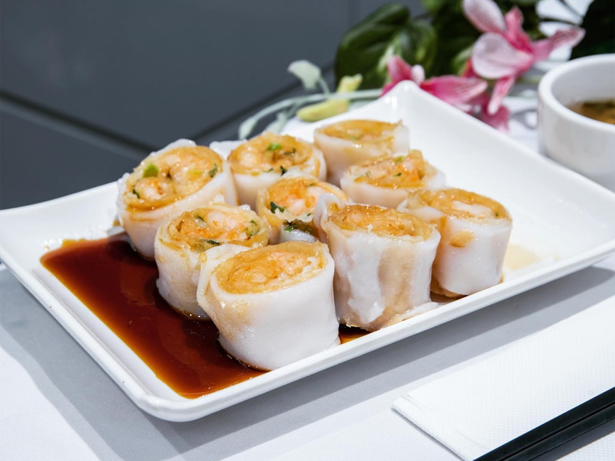 Rice flour rolls on a plate with soy dressing