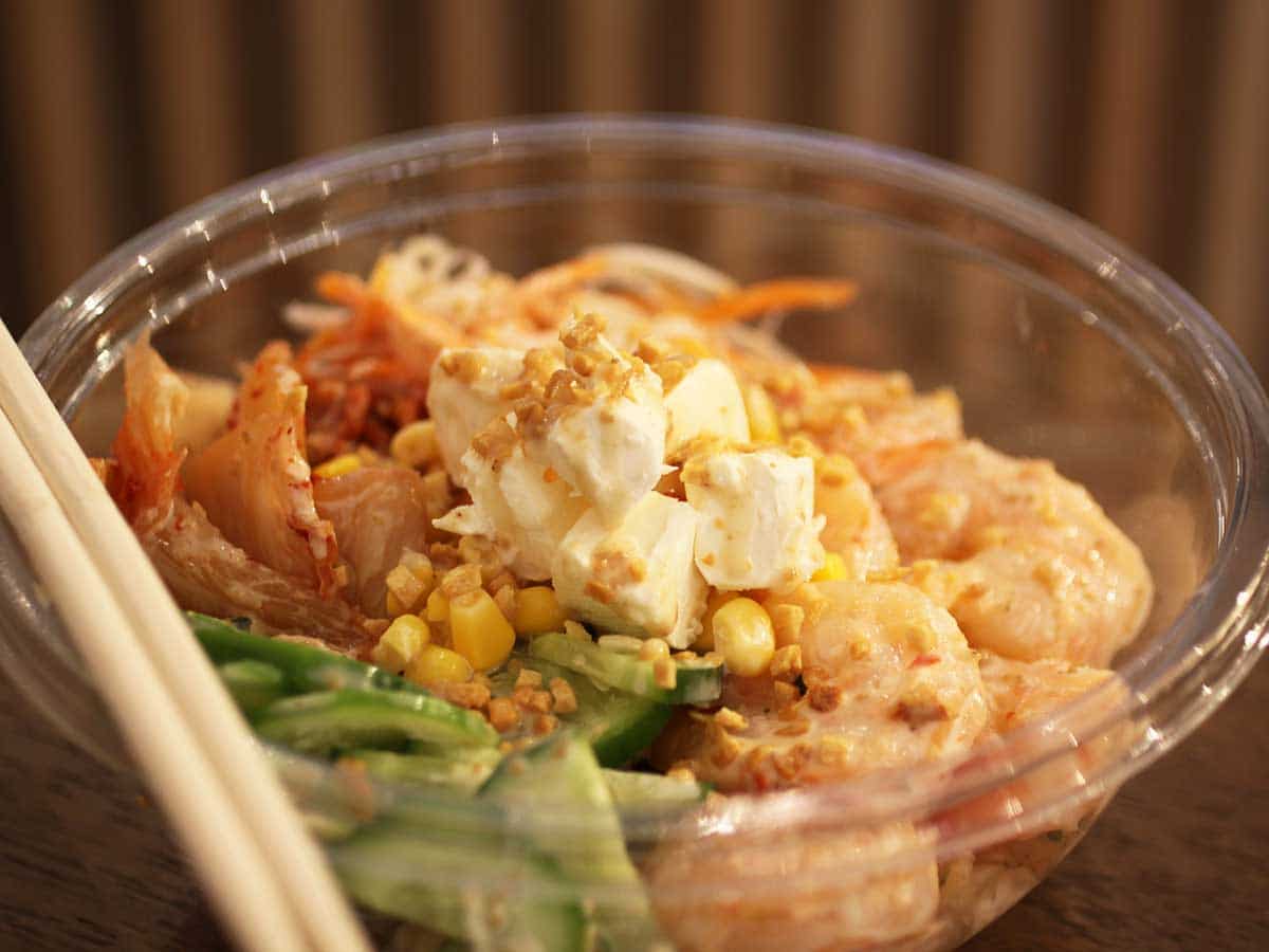Poke bowl set on a wooden table