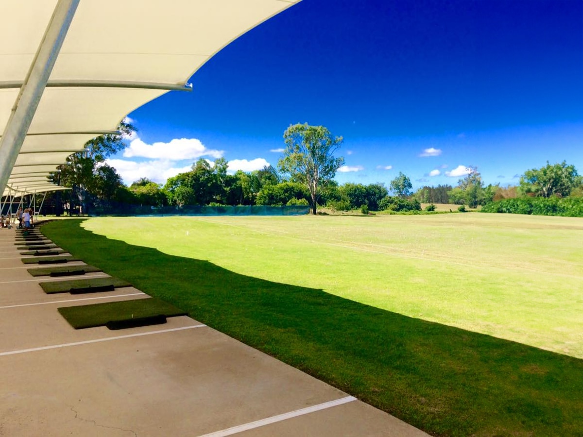 A golf driving range with shade
