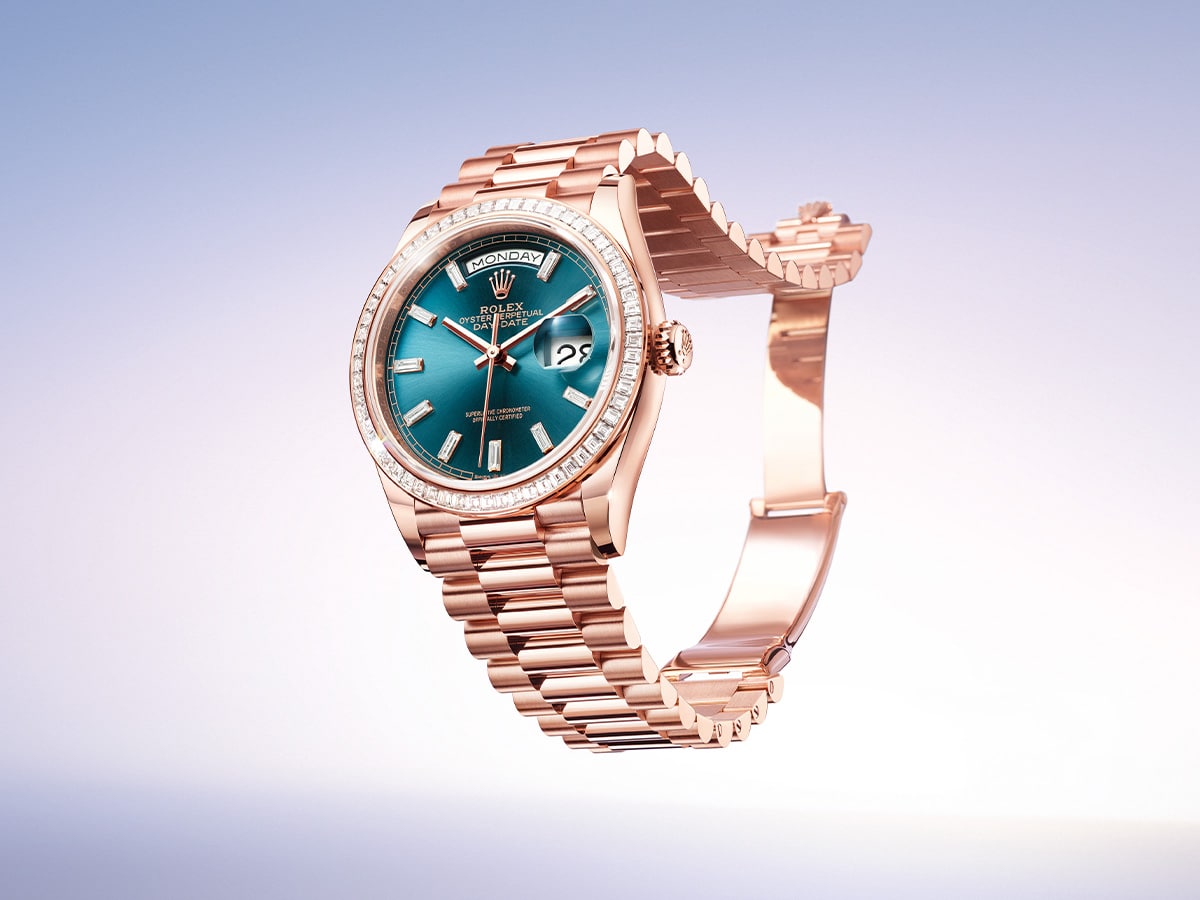 Day date 36 in 18 ct everose gold with blue green dial