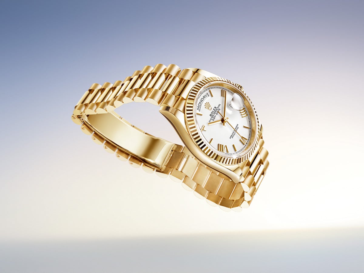 Day date 36 in 18 ct yellow gold with white lacquer dial
