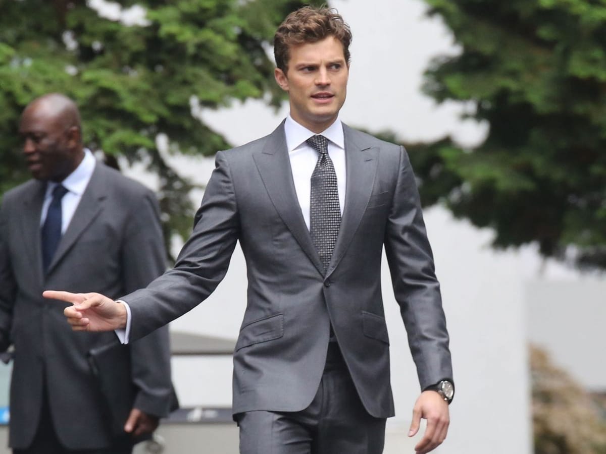 Jamie Dornan in a grey suit
