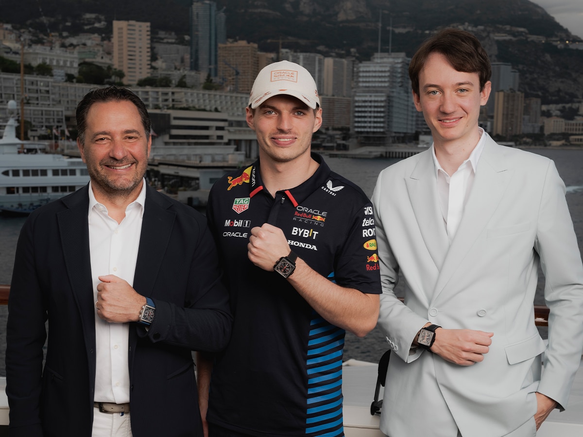 TAG Heuer CEO Julien Tornare (L), Oracle Red Bull Racing drive Max Verstappen (M) and LVMH Watches CEO Frédéric Arnault (R) with the new TAG Heuer Monaco Chronograph | Image: TAG Heuer