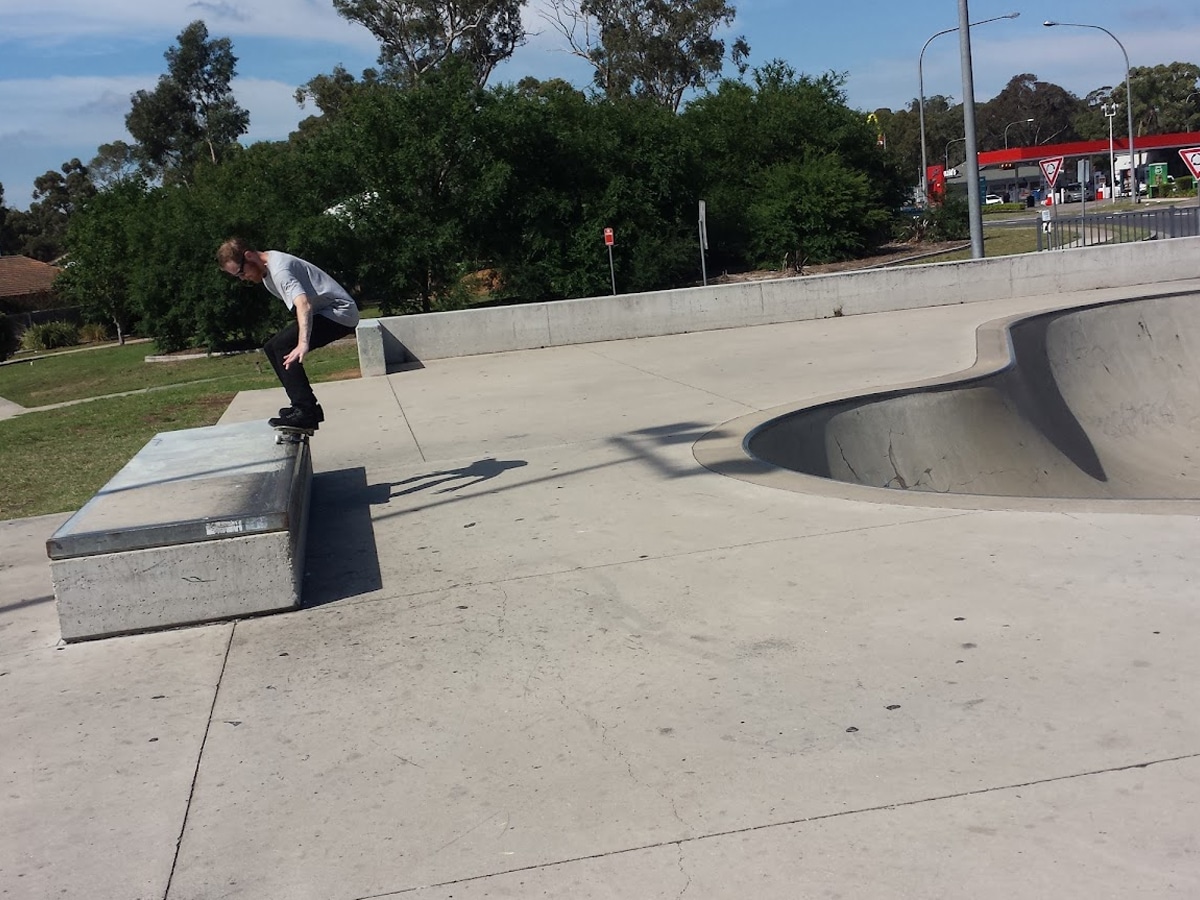 man skateboarding at Macquarie Fields Skate Park