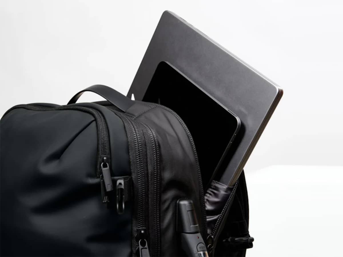 laptop and tablet inside the Airback Matt Black backpack