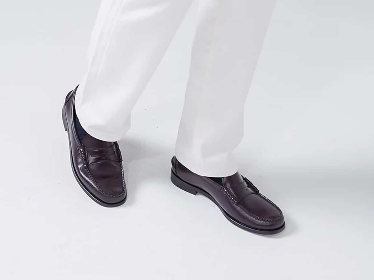 Penny loafers on foot