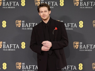 Joe Alwyn's BAFTAs Suit is a Triple Plum Lesson in 1990s Style