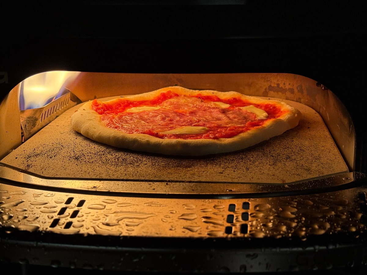 Gozney tread cooking pizza