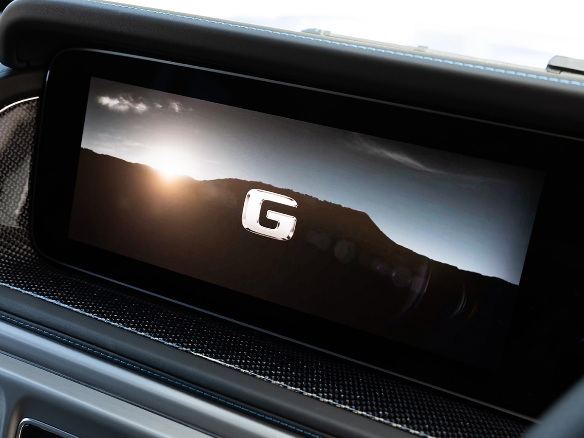 Mercedes benz g 580 with eq technology g logo on screen